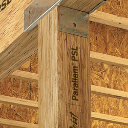 A Parallam PSL column carrying a beam through a metal cap connector, the long parallel strands visible on the post's face